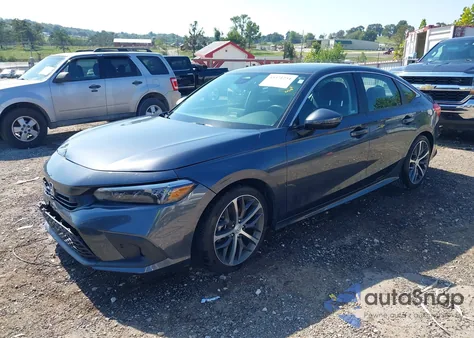 2023 Honda Civic Touring z USA, uszkodzony, nr VIN 2HGFE1F94PH321019